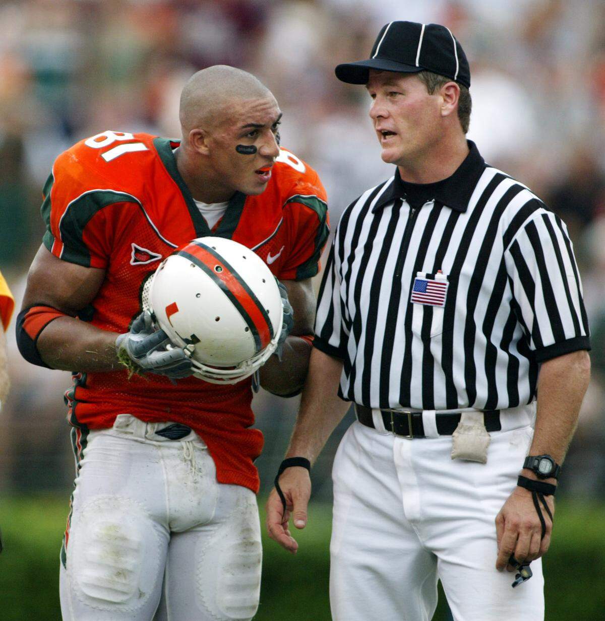 UM’s Kellen Winslow II argues a showboating penalty with a referee during the 4th quarter of a 2003 UM game against Tennessee in the Orange Bowl.