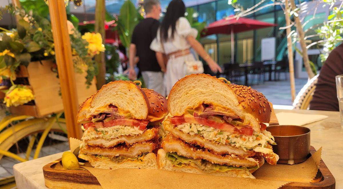 The chicken schnitzel sandwich at Motek, pictured here at the Aventura location, is almost too big to fit in your mouth. Almost.