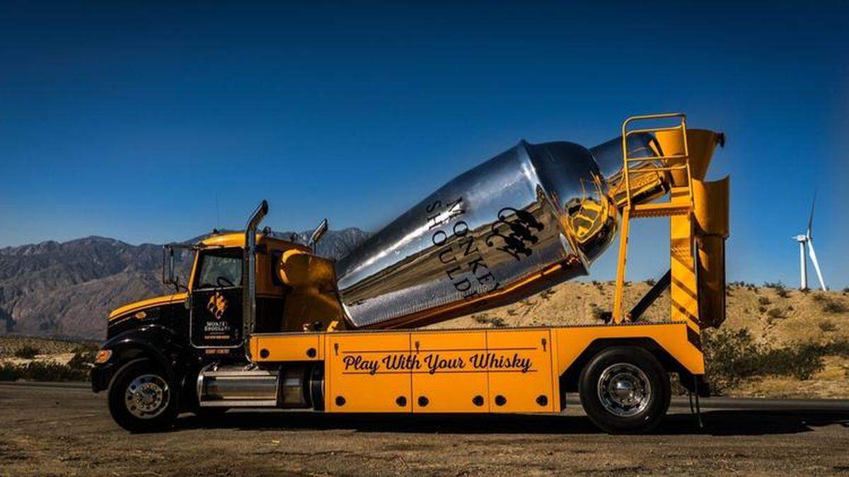 Monkey Shoulder Whisky’s promotional scheme features a yellow cement truck’s revolving drum shaped like a silver cocktail mixer. The truck will be driving around the Orlando, Florida area in late March 2019.