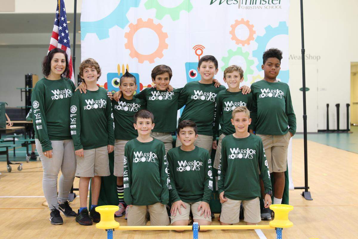 Westminster Christian School students recently competed in the Robotics Education and Competition Foundation’s 2018 VEX IQ Robotics Competition and won the Design Award. The winning elementary students are pictured with their teacher, Claudia Pastrana.