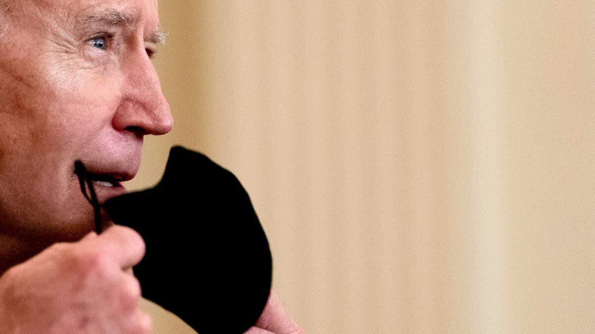 In this photo, President Joe Biden takes off his faces mask to speak about COVID-19 vaccinations, in the East Room of the White House, Thursday, March 18, 2021, in Washington. Most of the country isn’t recommended to wear a mask indoors in public, the CDC says, as statewide mandates lift. Masking is extended for public transportation.