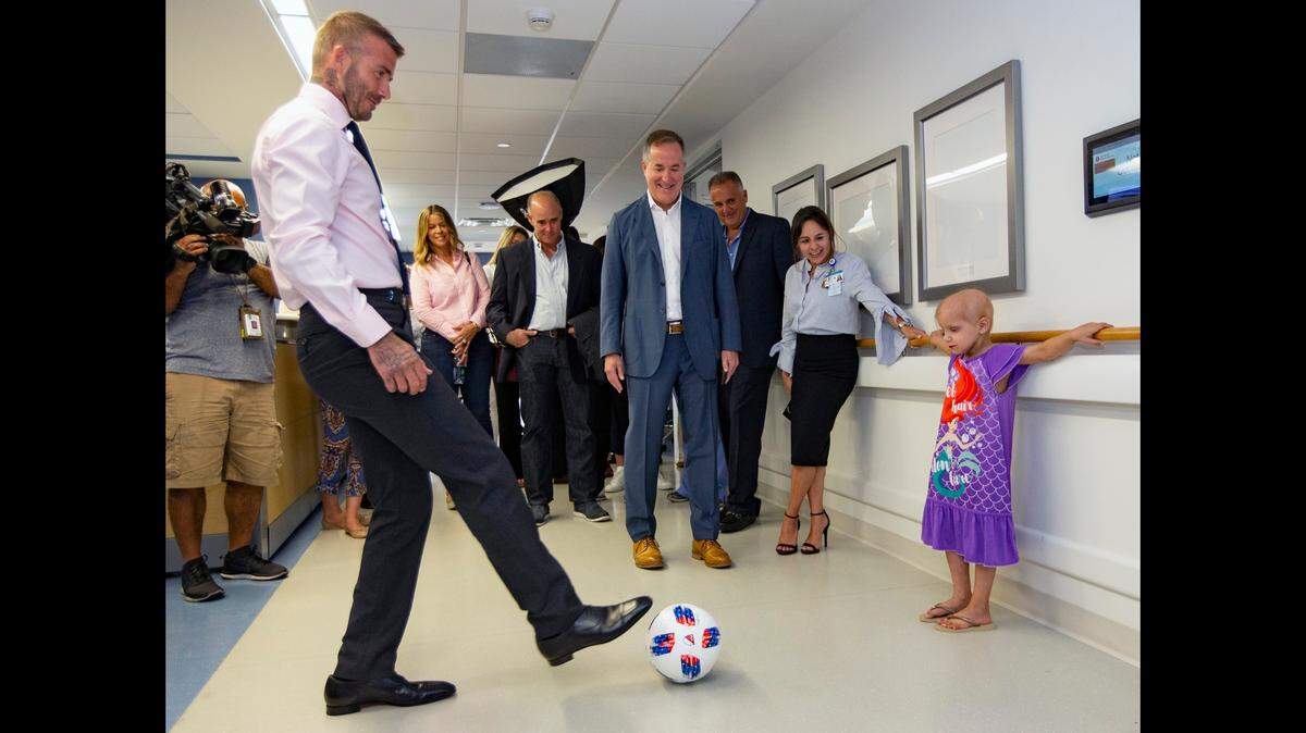 David Beckham played soccer in the hospital hallway with patient Stefania Tarulla, 5, as he visited children being treated for cancer at Nicklaus Children’s Hospital on Wednesday, July 11, 2018.