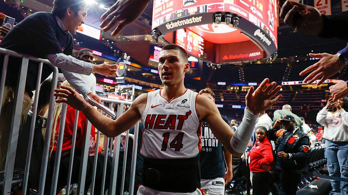 Tyler Herro #14 of the Miami Heat reacts following the Heat's 128-97 victory over the Atlanta Hawks at State Farm Arena on February 20, 2026 in Atlanta, Georgia.