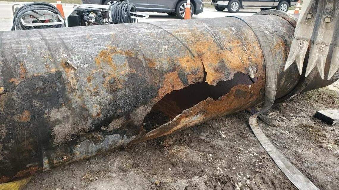 A large gash is shown on a Florida Keys Aqueduct Authority water pipe Thursday, March 9. 2023. The pipe break caused several government offices and Keys schools to close.