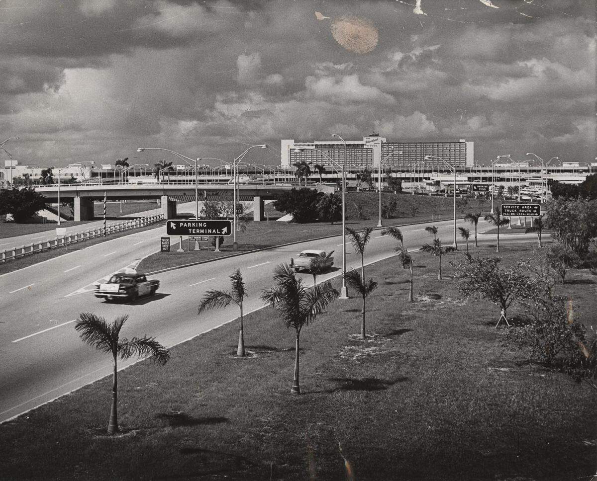 Miami International Airport sign to terminal parking in 1962.