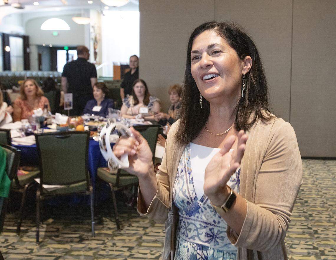 Rabbi of Temple Judea Judith Siegel plays tambourine during Third Annual South Dade Community Women's Passover Seder on Sunday, March 30, 2026 at Temple Judea in Coral Gables. Andrew Uloza / for Miami Herald