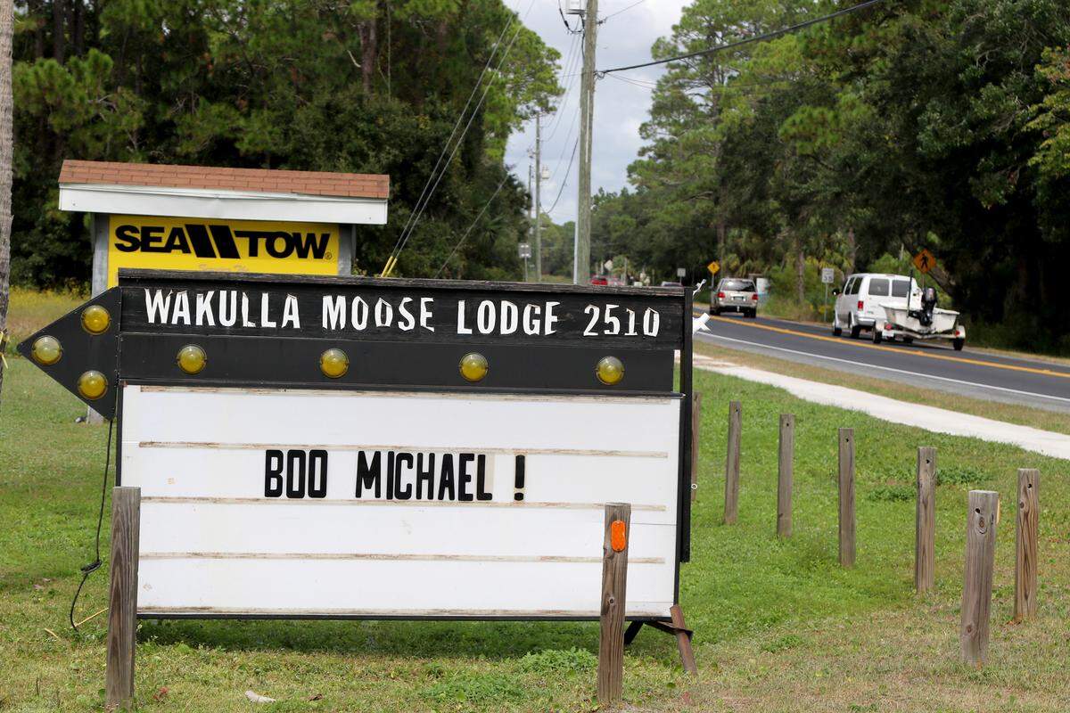 The Wakulla Moose Lodge 2510 shows disdain for Hurricane Michael in downtown Panacea on Tuesday as the storm churns toward the Florida Panhandle carrying predictions of a major Category 3 landfall late Wednesday. Forecasters predicted 8 to 12 feet of surge in the Big Bend area, along with catastrophic winds above 110 mph.