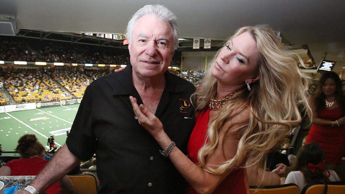 David Siegel and his wife Jackie, owners of the Orlando Predators, are pictured in their suite during the Arizona Rattlers at Orlando Predators AFL game on July 26, 2014 at the CFE Arena on the UCF campus in Orlando, Fla. (Photo by Stephen M. Dowell/Orlando Sentinel/TNS)