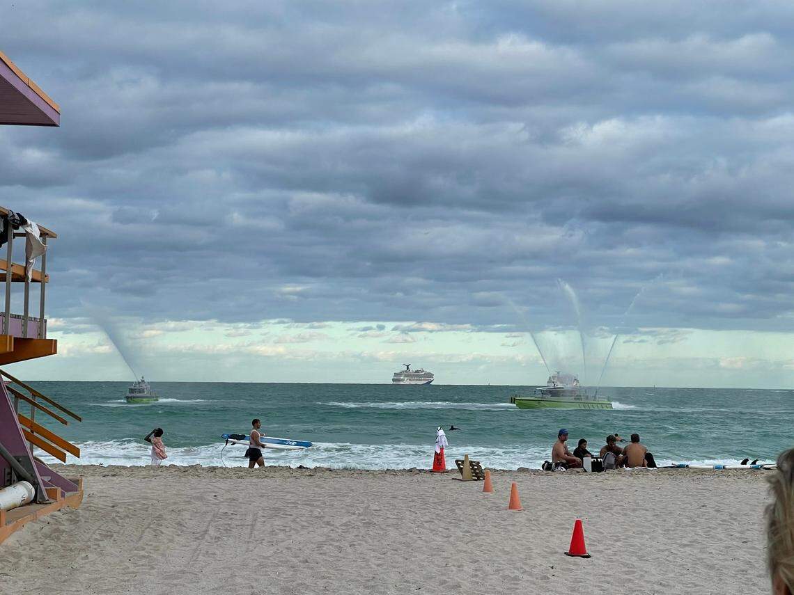 Two Miami-Dade Fire Rescue boats fired water cannons into the air on Saturday, Nov. 16 in an honorary show at a memorial service for 19-year-old Victor Castaneda, who lost his life while swimming in Miami Beach.