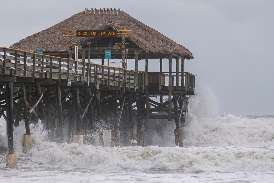 Waves crash onto the pierce under the Rikki Tiki Tavern in Cocoa Beach as winds from the outer bands of Hurricane Dorian start to kick up the surf on Tuesday, September 3, 2019.