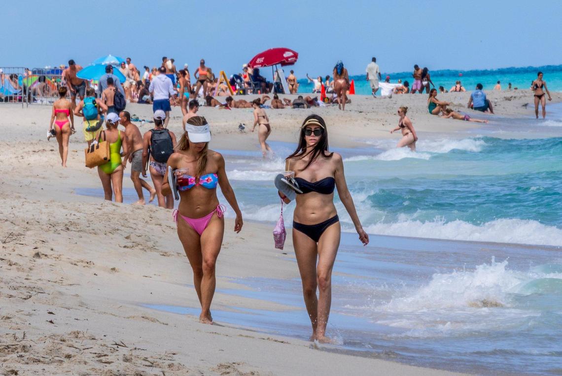 Beachgoers enjoy the nice weather in South Beach, during spring break, in Miami Beach, Florida, on Saturday March 22, 2025.