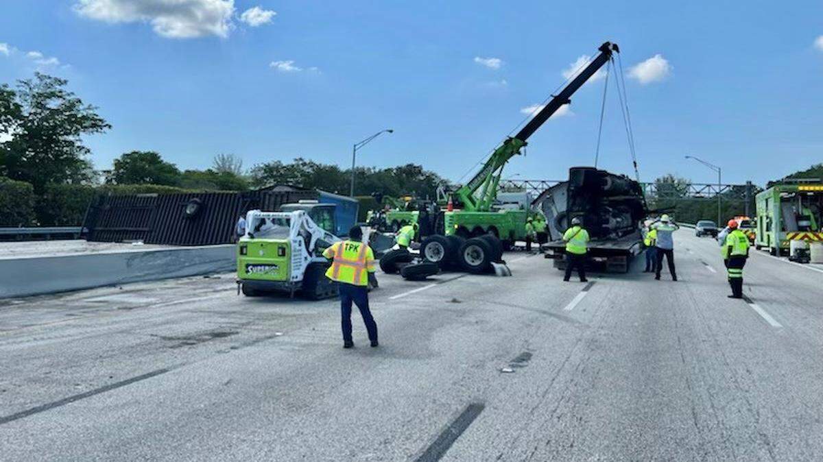 The cleanup of the jackknifed tractor-trailer that has Florida’s Turnpike shut down in both directions.