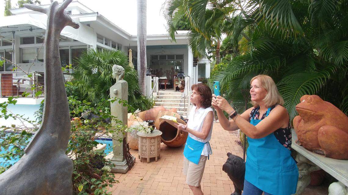 Kathy Matz, left, and Sue Puskedra, of Susie’s Estates Key West, work on arranging hundreds of items that David Wolkowsky owned. An estate sale is set for Friday through Sunday, 9 a.m. to 2 p.m. all days, at 1014 Flagler Ave. in Key West.