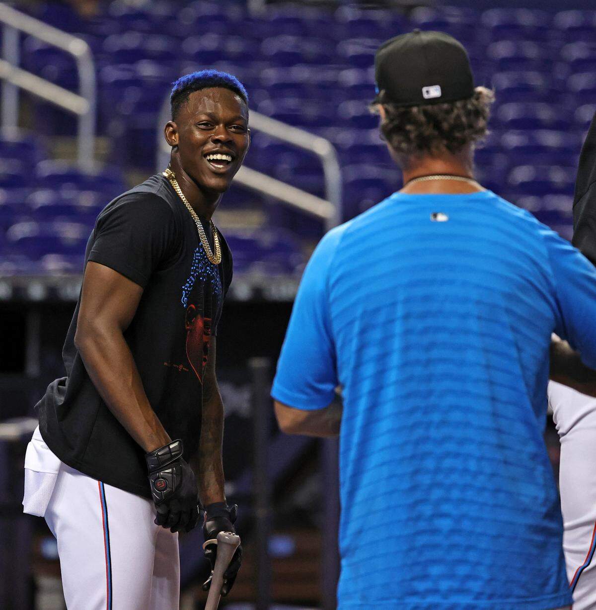 Miami Marlins manager Don Mattingly (8) talks with Marlins middle infielder Jazz Chisholm Jr. (2) during batting practice before the start of their baseball game against the Colorado Rockies at loanDepot park on Wednesday, June 9, 2021 in Miami, Florida.