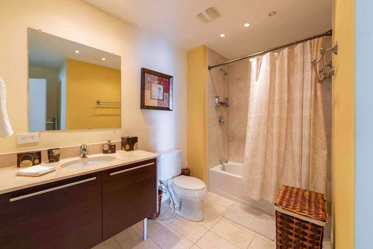 The apartment’s single bathroom, pictured above, has a bathtub.