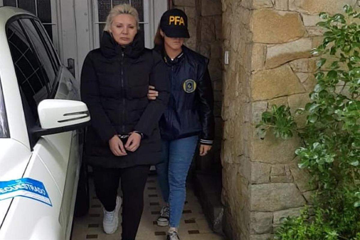 Elizabeth Municoy, who ran a realty firm in Surfside, is arrested by Argentine federal police last month for her alleged involvement in a money-laundering scheme. Municoy and others are accused of using dirty money to buy tens of millions of dollars in South Florida real estate.