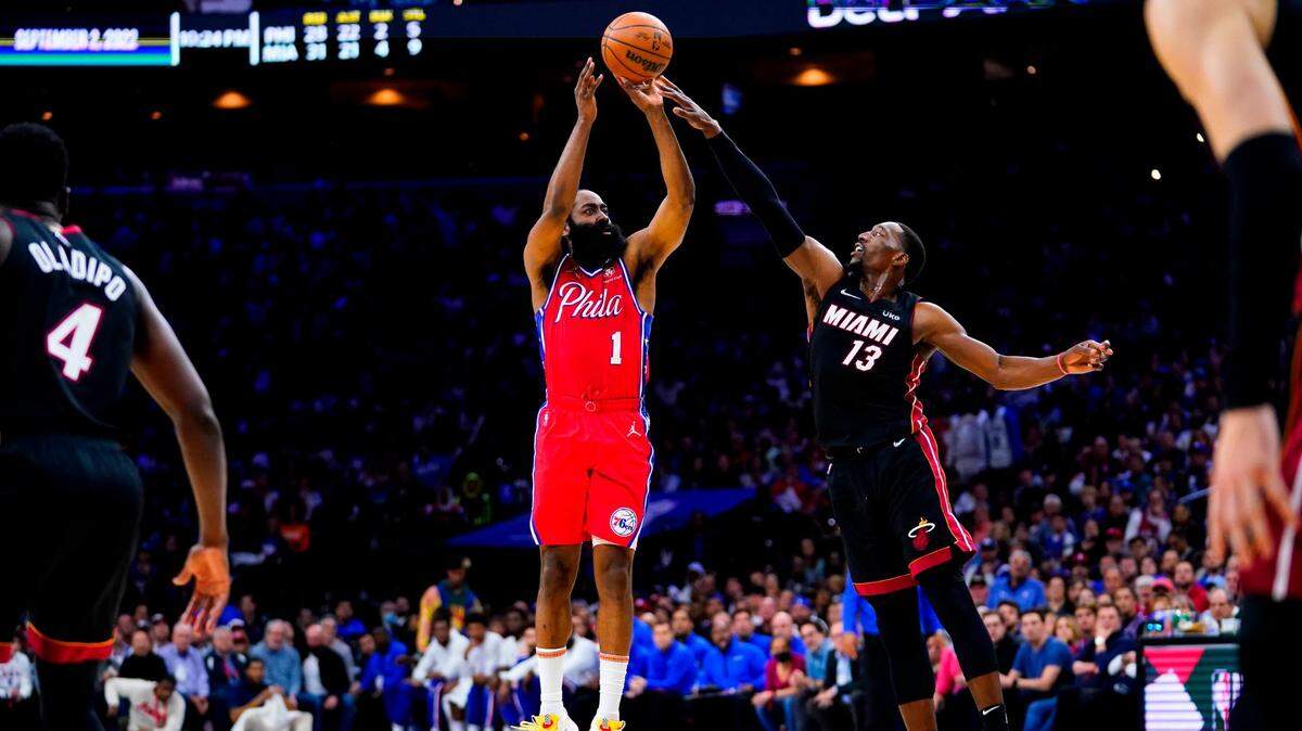 Philadelphia 76ers’ James Harden (1) goes up for a shot against Miami Heat’s Bam Adebayo during the second half of Game 4 of an NBA basketball second-round playoff series, Sunday, May 8, 2022, in Philadelphia.