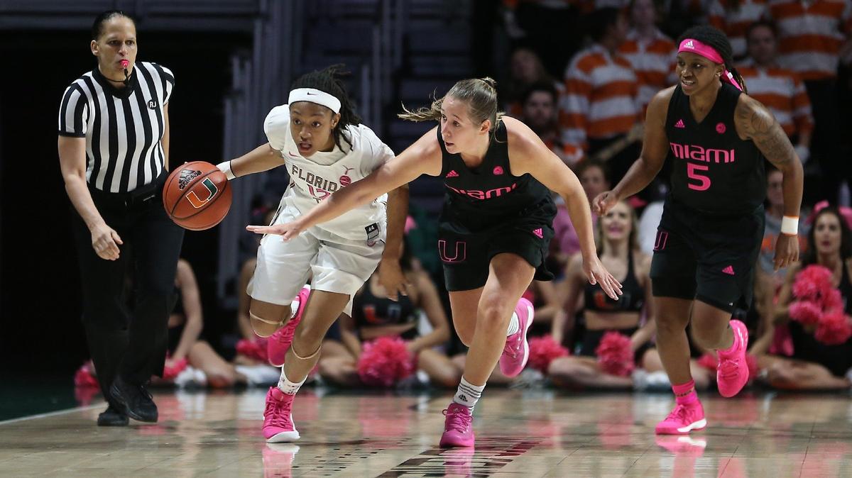 The University of Miami’s #1 Laura Cornelius reaches in as FSU’s #12 Nicki Ekhomu dribbles up the court as the University of Miami women’s basketball team beat FSU 64-54 on Sunday, February 24, 2019.