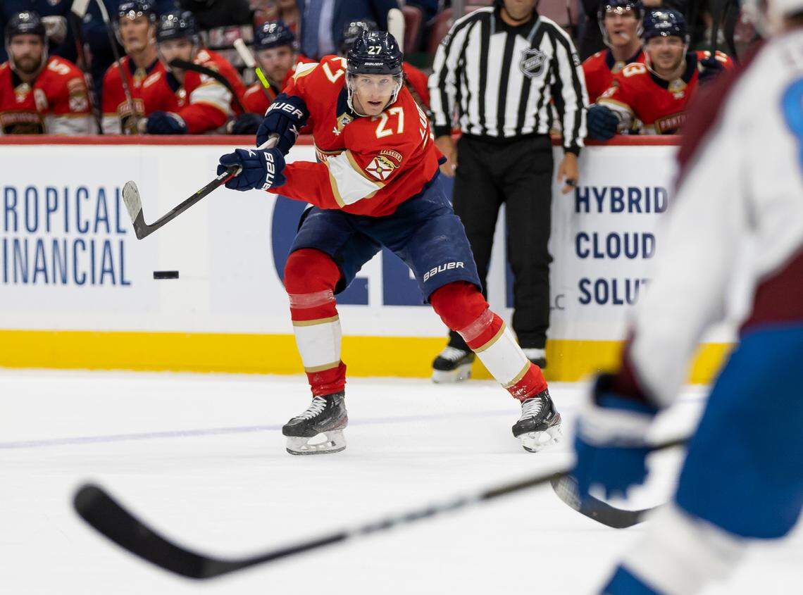 Florida Panthers center Eetu Luostarinen (27) passes the puck while Colorado Avalanche defenseman Andreas Englund (88) watches during the second period of an NHL game at the FLA Live Arena on Saturday, Feb. 11, 2023, in Sunrise, Fla.