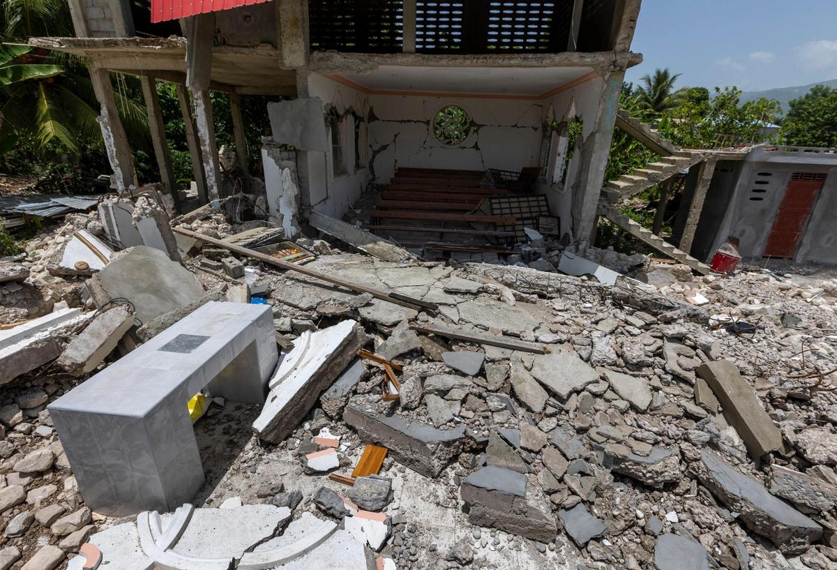 The altar still stands in what remains of St. Rose of Lima Catholic Church in the town of Maniche in southwestern Haiti after it was rocked by an earthquake on Aug. 14, 2021.