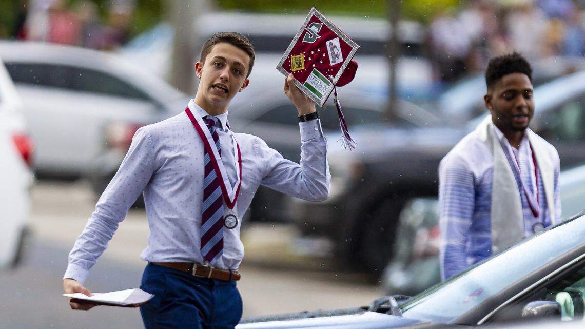 A Marjory Stoneman Douglas High School senior reacts after leaving his graduation ceremony at the BB&T Center in Sunrise on Sunday, June 3, 2018.  Broward County classes ended Wednesday.