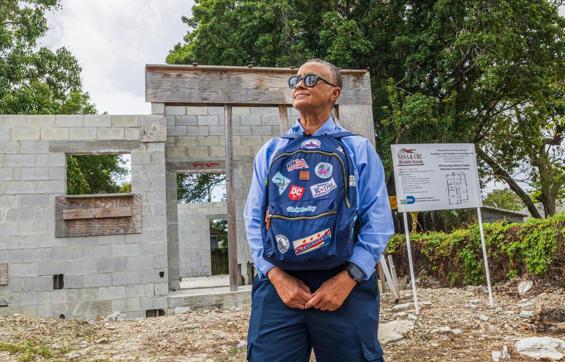 Angela Albury expresses her frustration about waiting five years for her house to be constructed as she attended a press conference held by the Neighbors and Neighbors Association on Tuesday, March 25, 2025.