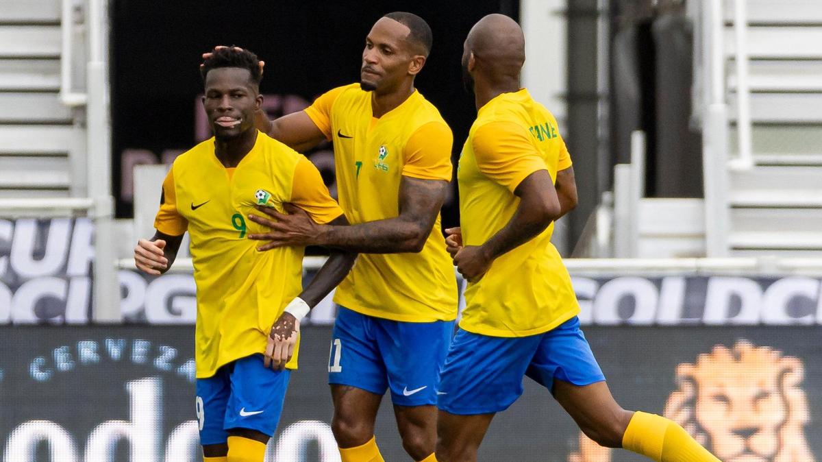 French Guiana forwards Arnold Abelinti (9) and Thomas Issorat (11) celebrate after scoring a penalty against Sint Maarten in the first half of their CONCACAF Gold Cup 2023 preliminary match at DRV PNK Stadium on Saturday, June 17, 2023, in Fort Lauderdale, Fla.