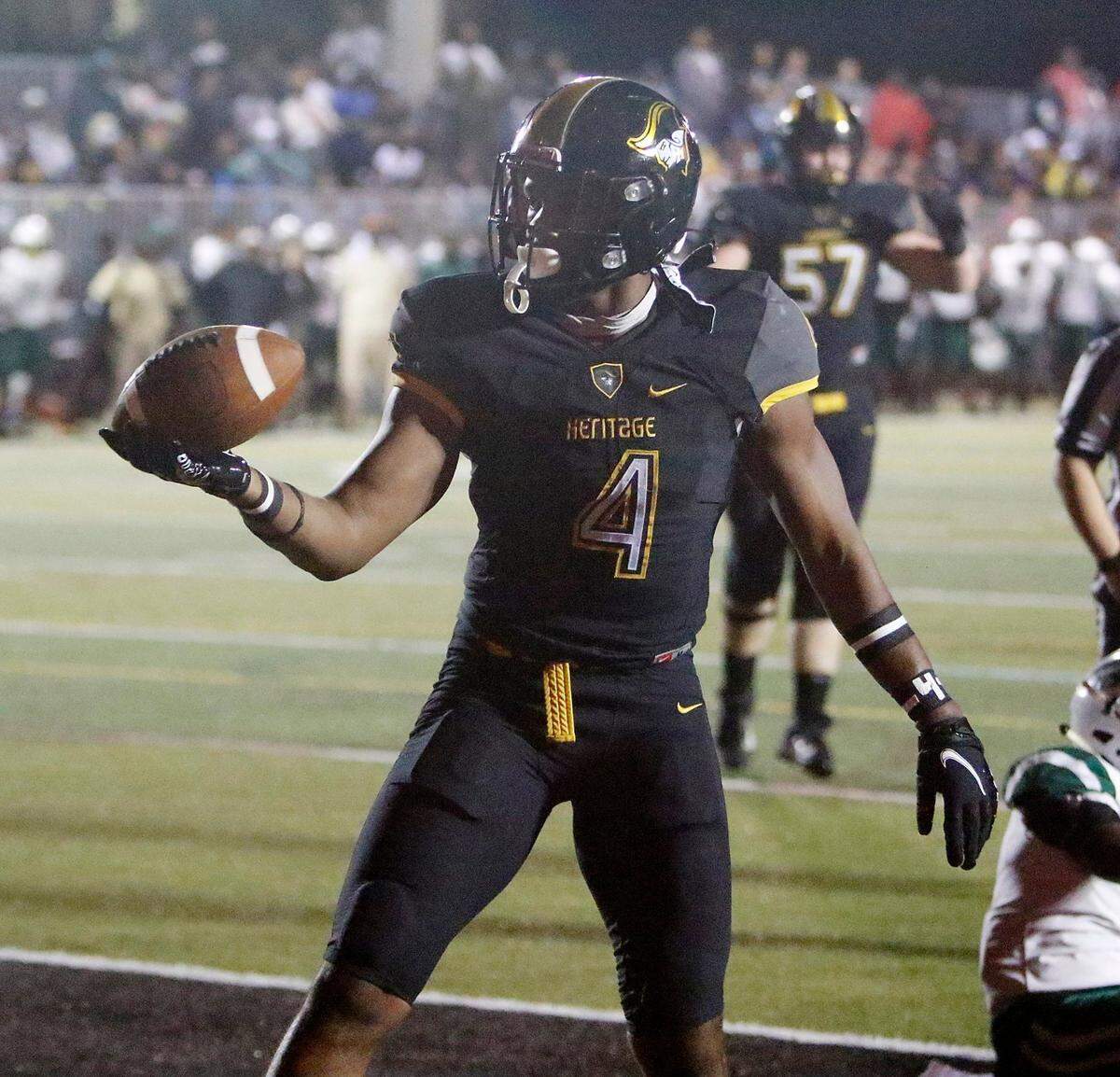 American Heritage Patriots running back Mark Fletcher(4) celebrates a touchdown against Miami Central Rockets during regional semifinal football game on Friday, November 19, 2021 at American Heritage HS in Plantation. Andrew Uloza / for THE MIAMI HERALD