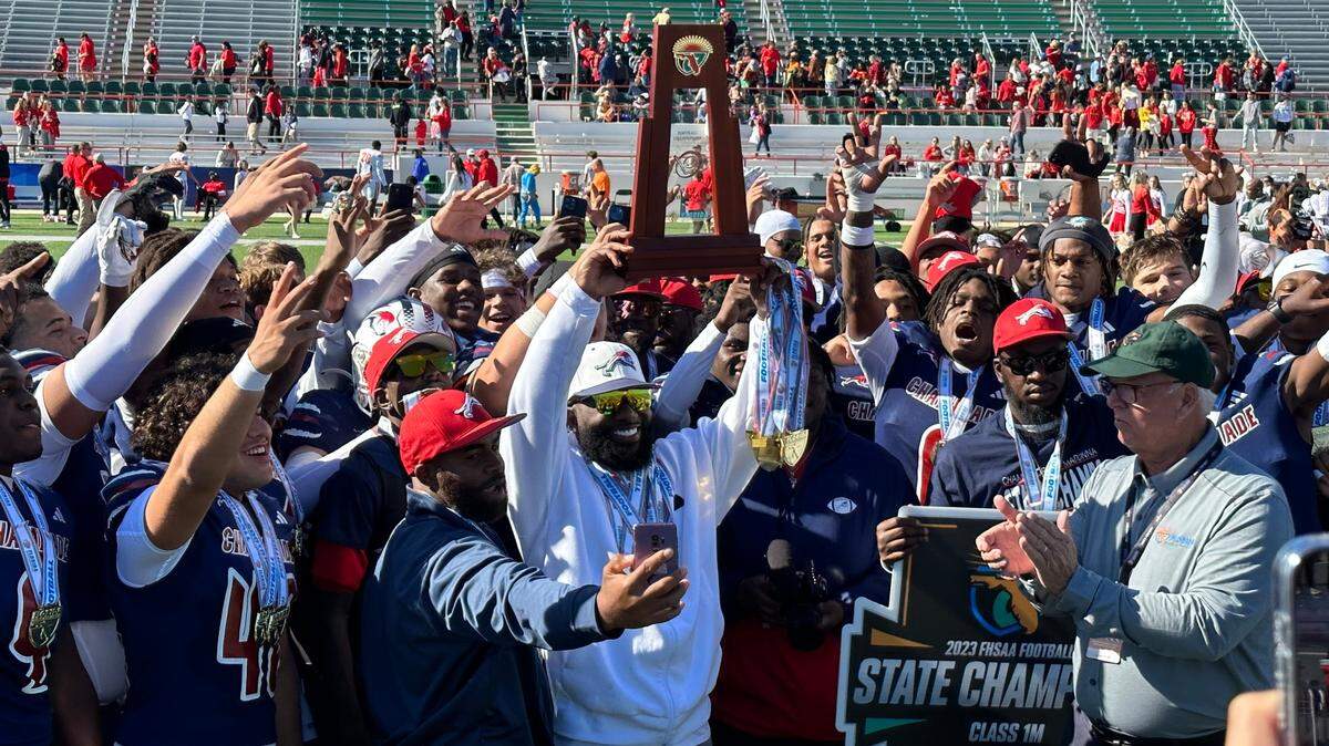 Chaminade-Madonna’s football team celebrates after beating Clearwater Central Catholic on Thursday at Bragg Memorial Stadium in Tallahassee, Fla.