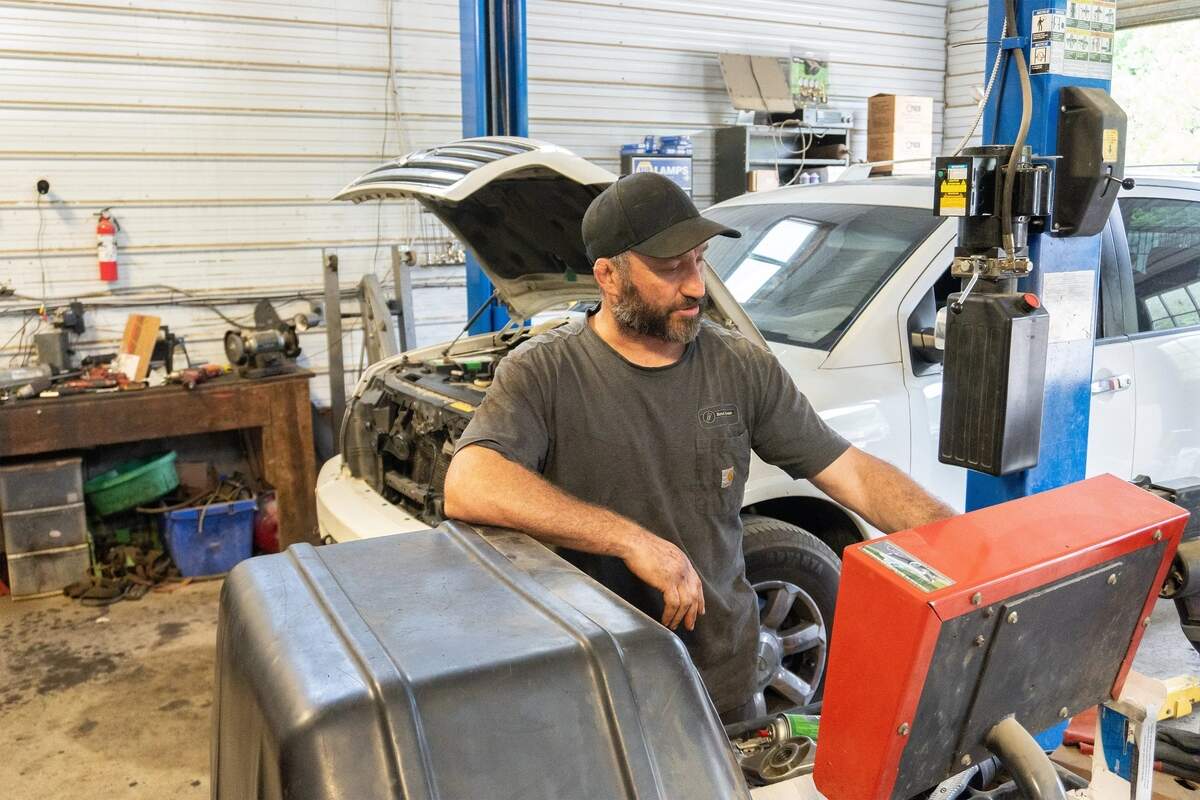 Ross Tobiassen built his auto shop, which he owns with his wife, next to his home on his property in western North Carolina.
