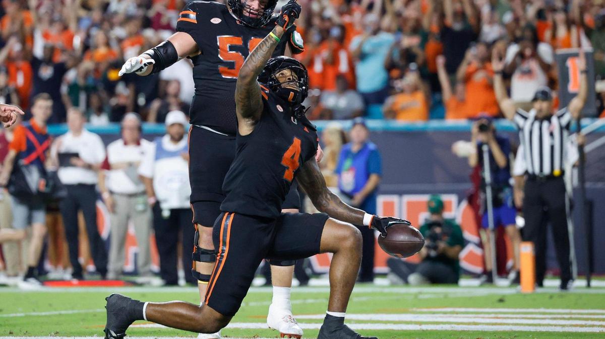 Miami Hurricanes running back Mark Fletcher Jr. (4) reacts after scoring against the Florida State Seminoles in the first half during an NCAA football game at Hard Rock Stadium in Miami Garden, Florida on Saturday, October 26, 2024.