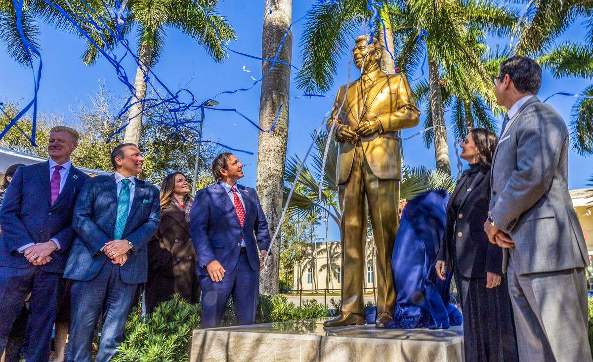 Attendees joined Florida International University President Jeanette Nuñez (right) and Florida’s Governor Ron DeSantis (center) during the unveiling ceremony of a statue of former President Ronald Reagan, by Cuban American artist Carlos Enrique Prado, marking what would have been his 115th birthday, on Feb. 06, 2026 