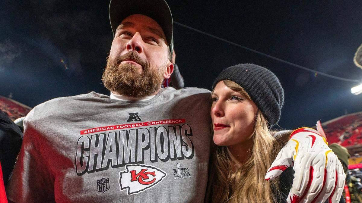 Kansas City Chiefs tight end Travis Kelce (87) and pop star Taylor Swift walk off the field after the trophy ceremony following the Chiefs’ 32-29 victory over the Buffalo Bills in the AFC Championship Game on Sunday, Jan. 26, 2025, at GEHA Field at Arrowhead Stadium.