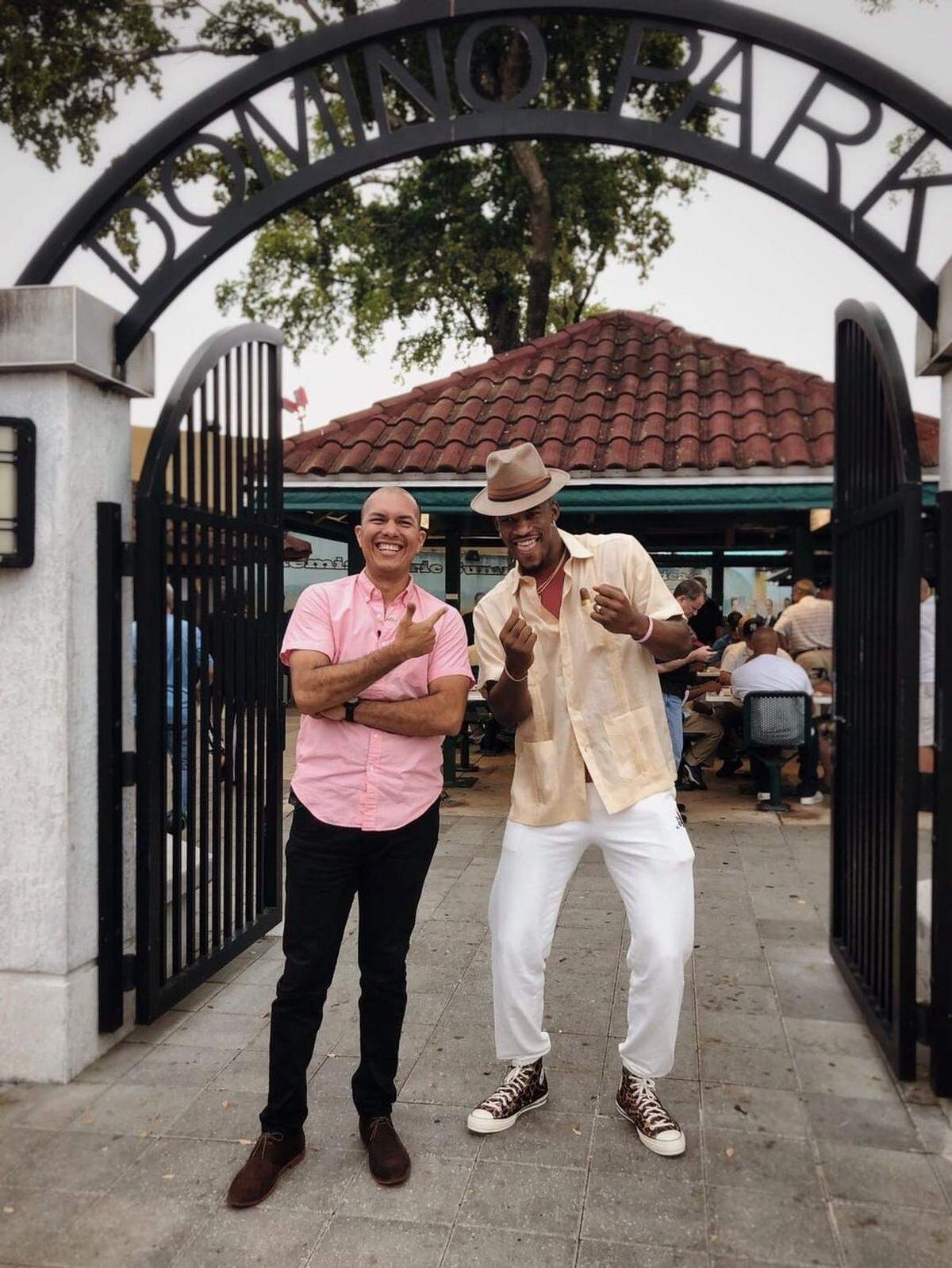 Jimmy Butler took a tour of Little Havana on April 9 before the 76ers’ game against the Heat in Miami. Little Havana community representative Marvin Tapia (left) gave Butler the tour.
