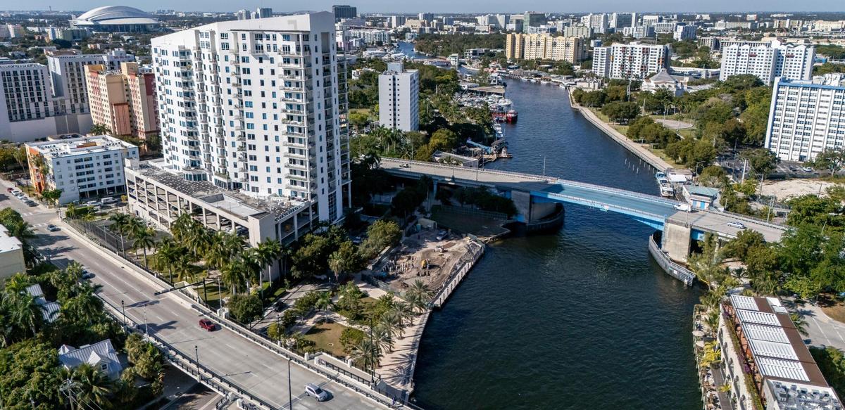 Aerial view shows construction progress on privately owned land along the Miami River on Friday, Dec. 6, 2024, in Miami, Fla. Arturo Ortega, the property manager of South River Warehouse, owns the site and is in a dispute with City of Miami officials, who plan to seize it through eminent domain to create a public park honoring Simon Bolivar.