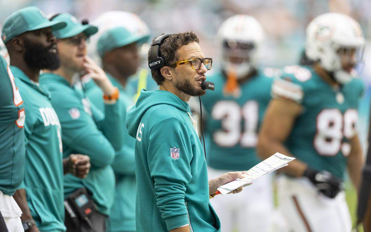 Miami Dolphins head coach Mike McDaniel watches his team play against the Cincinnati Bengals in the second half of their NFL game at Hard Rock Stadium on Sunday, Dec. 21, 2025, in Miami Gardens, Fla.