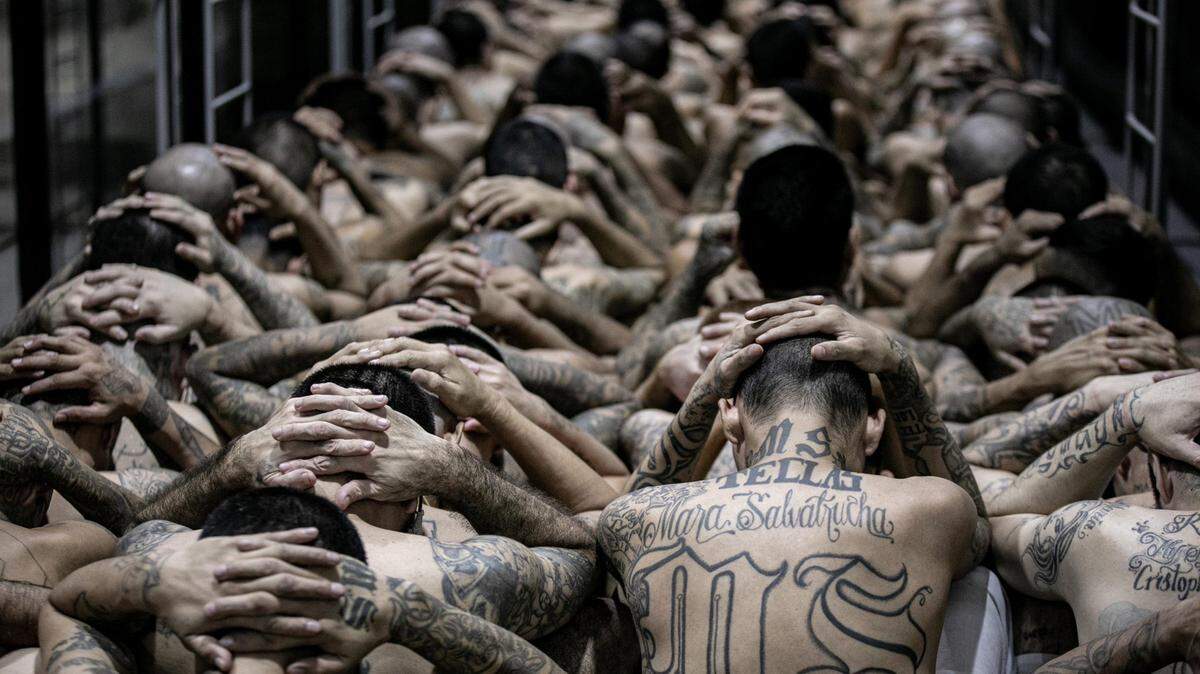 Detainees at the mega-prison Terrorist Confinement Center in El Salvador, where the Trump administration has sent hundreds of deportees under the 1798 Alien Enemies Act.
