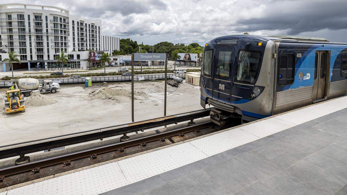 A Metrorail train arrives to the Douglas Road Station on Thursday, Aug. 7, 2025, in Miami.
