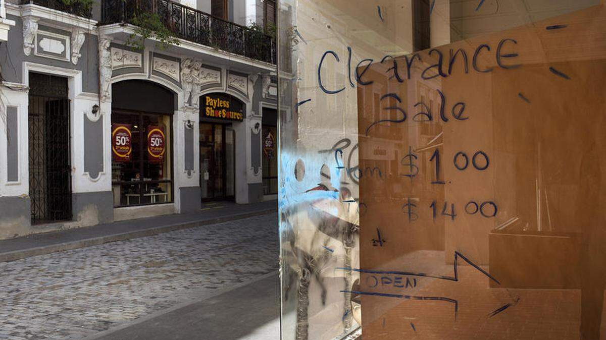 SAN JUAN, PUERTO RICO -- NOVEMBER 19: Signs of economic depression are visible in Old San Juan, Puerto Rico on Tuesday, November 19, 2013. Burdened by high unemployment, a shrinking population and overwhelming debt the small island is battling economic woes. (Photo by Nikki Kahn/The Washington Post)