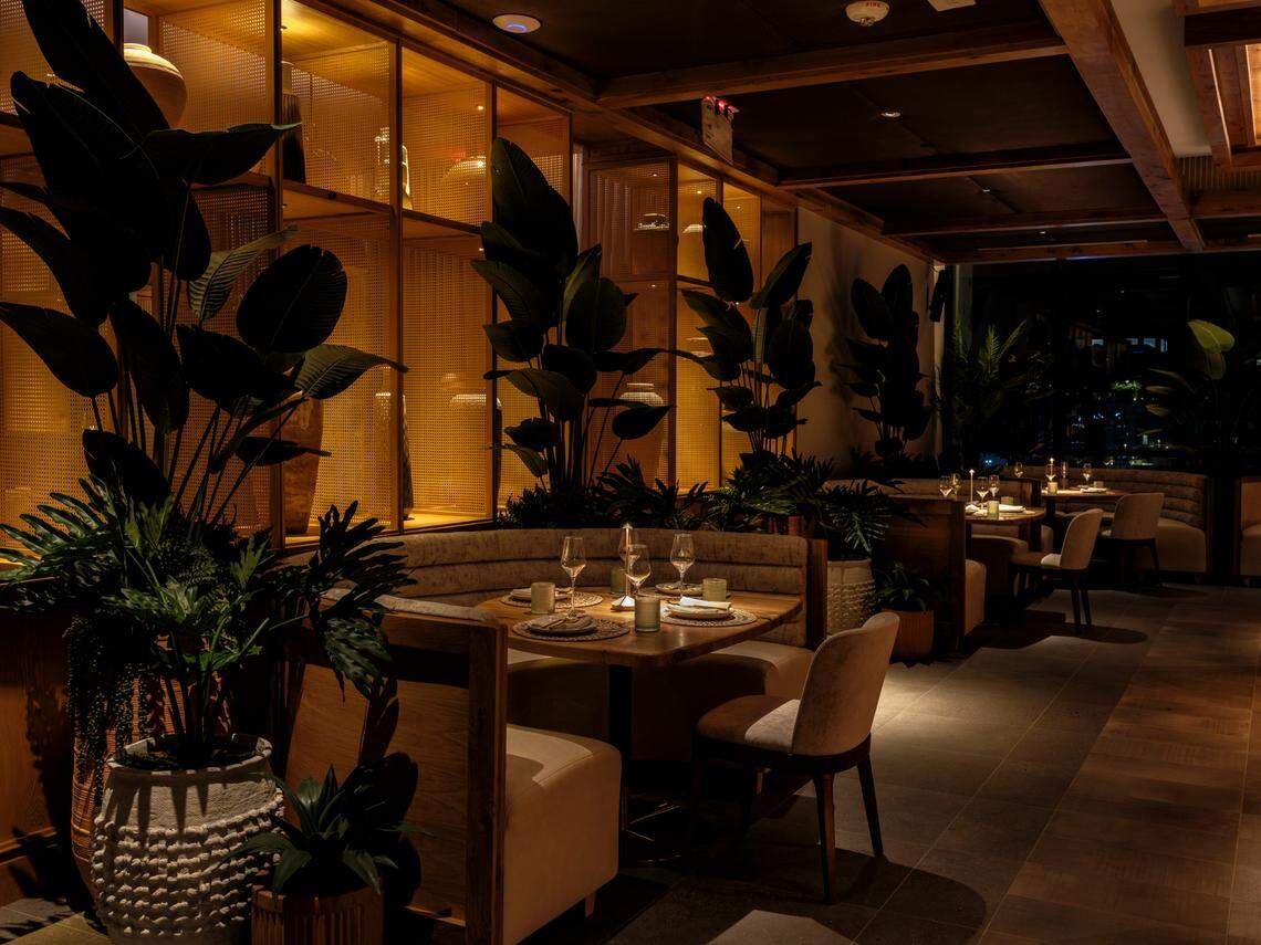 Dim lighting and views of Wynwood mark the main dining room of Casa Madera in Wynwood.