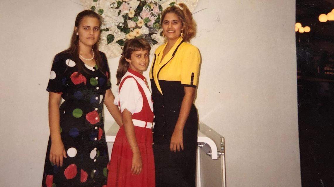 In this photo taken 10 days after the author’s arrival in Miami from Cuba, she is pictured with her two sisters. From left, Yusneli Padron. 14, Yusmari Padron, 9, and Yadira Padron, 18.