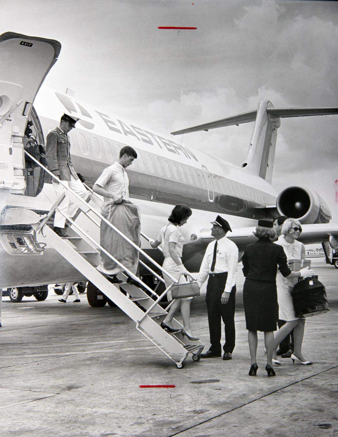 Eastern Airlines passengers disembark in the 1970s.