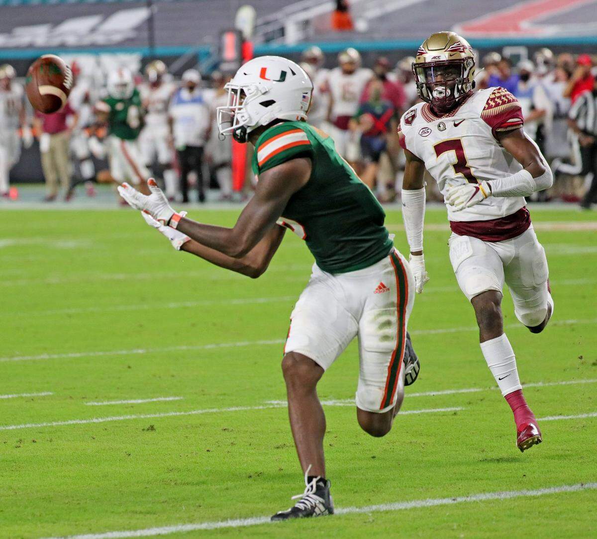 UM wide receiver Dee Wiggins (8) catches a second quarter touchdown against FSU on Sept. 26.
