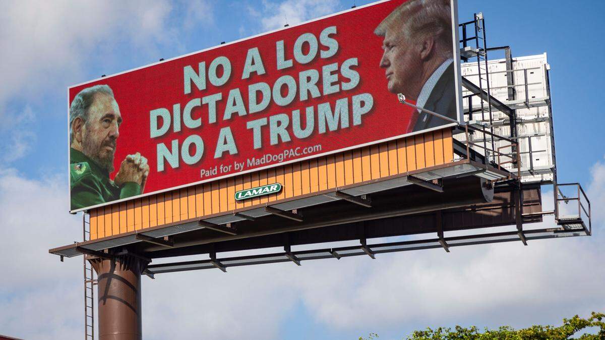 Miami, Florida, June 18, 2024 - An electronic billboard located on the Palmetto Expressway and Northwest 67th Avenue in Miami-Dade County shows an image of Fidel Castro and Donald Trump and tells voters to avoid dictators.