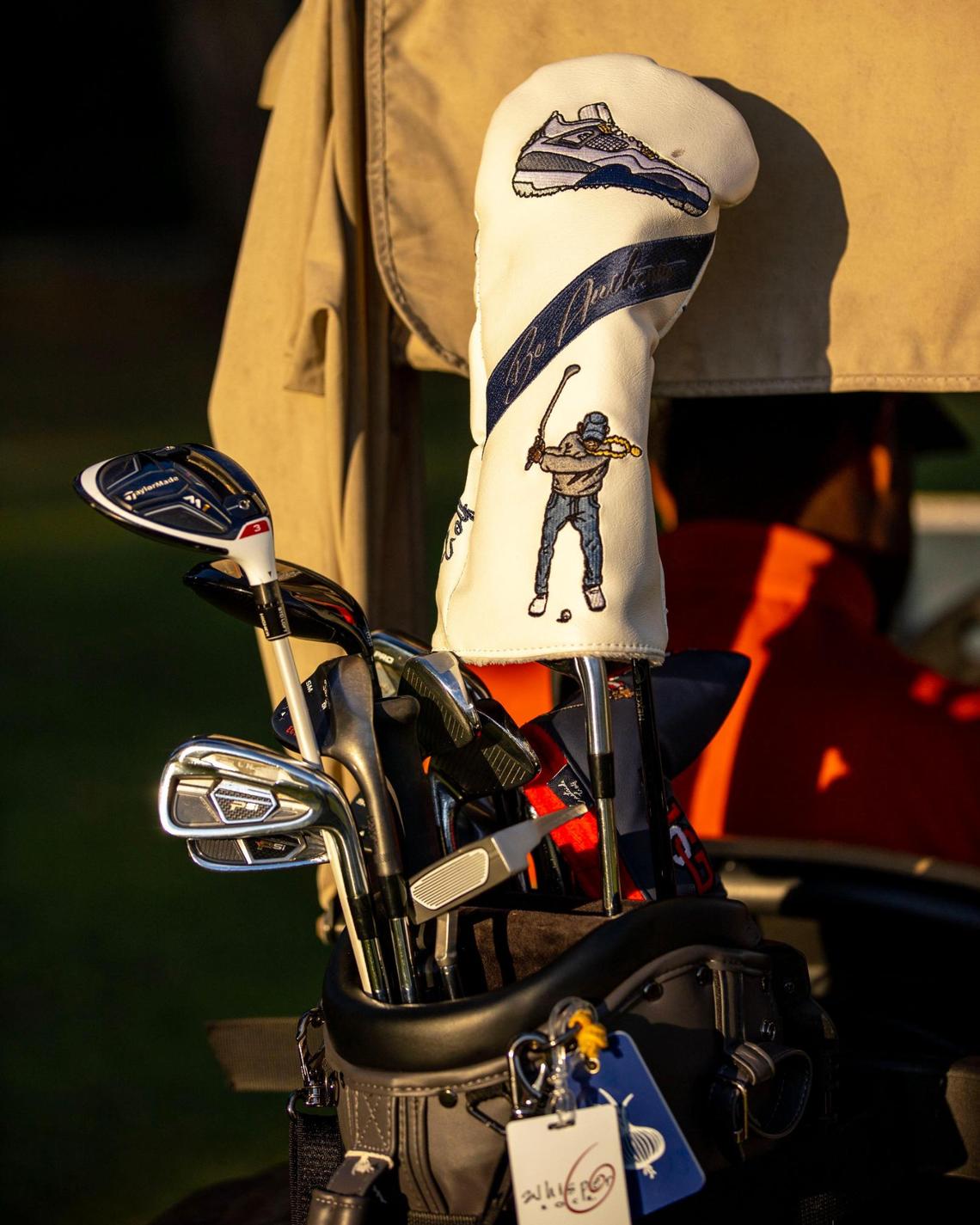 An Eastside Golf club head cover inside co-founder Earl A. Cooper’s golf bag at Miami Springs Golf & Country Club in Miami Springs, Florida, on Saturday, December 10, 2022.