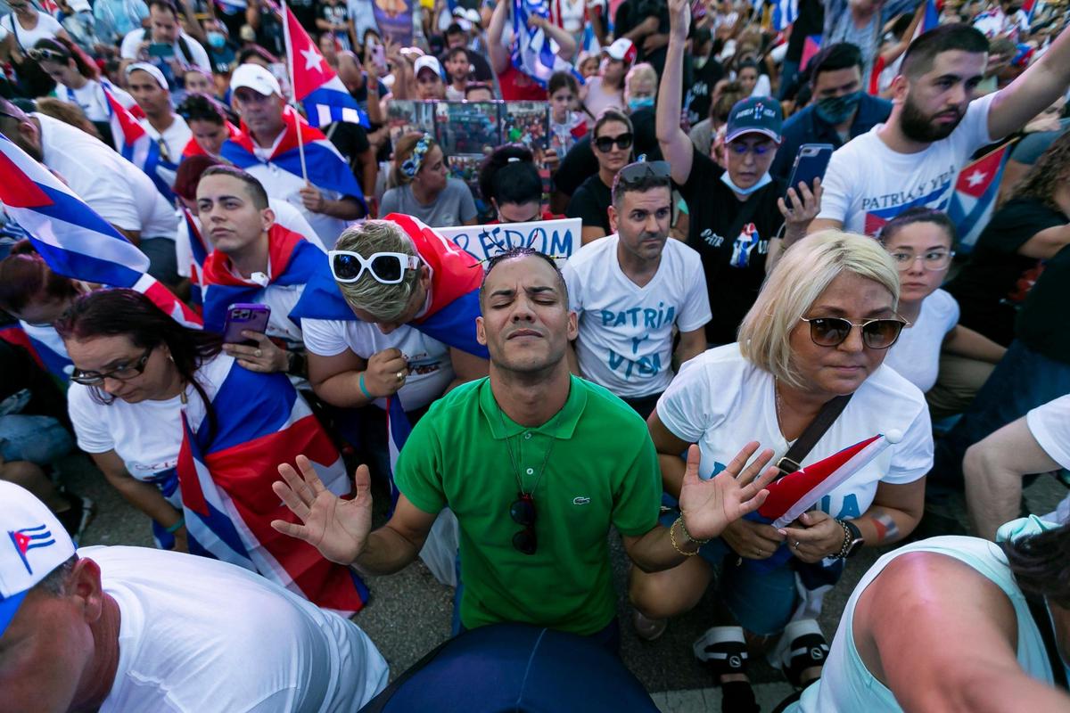 Activists participate in a rally at the Freedom Tower in downtown Miami on Saturday, July 17, 2021. The rally was held in solidarity with the protests happening in Cuba.