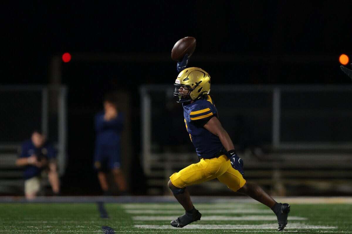 St. Thomas Aquinas Raiders linebacker Adras Donovan (9) celebrates after recovering a fumble against the Chaminade-Madonna Lions during the fourth quarter of a high school football game at St. Thomas Aquinas in Fort Lauderdale, Florida, Friday, October 31, 2025.