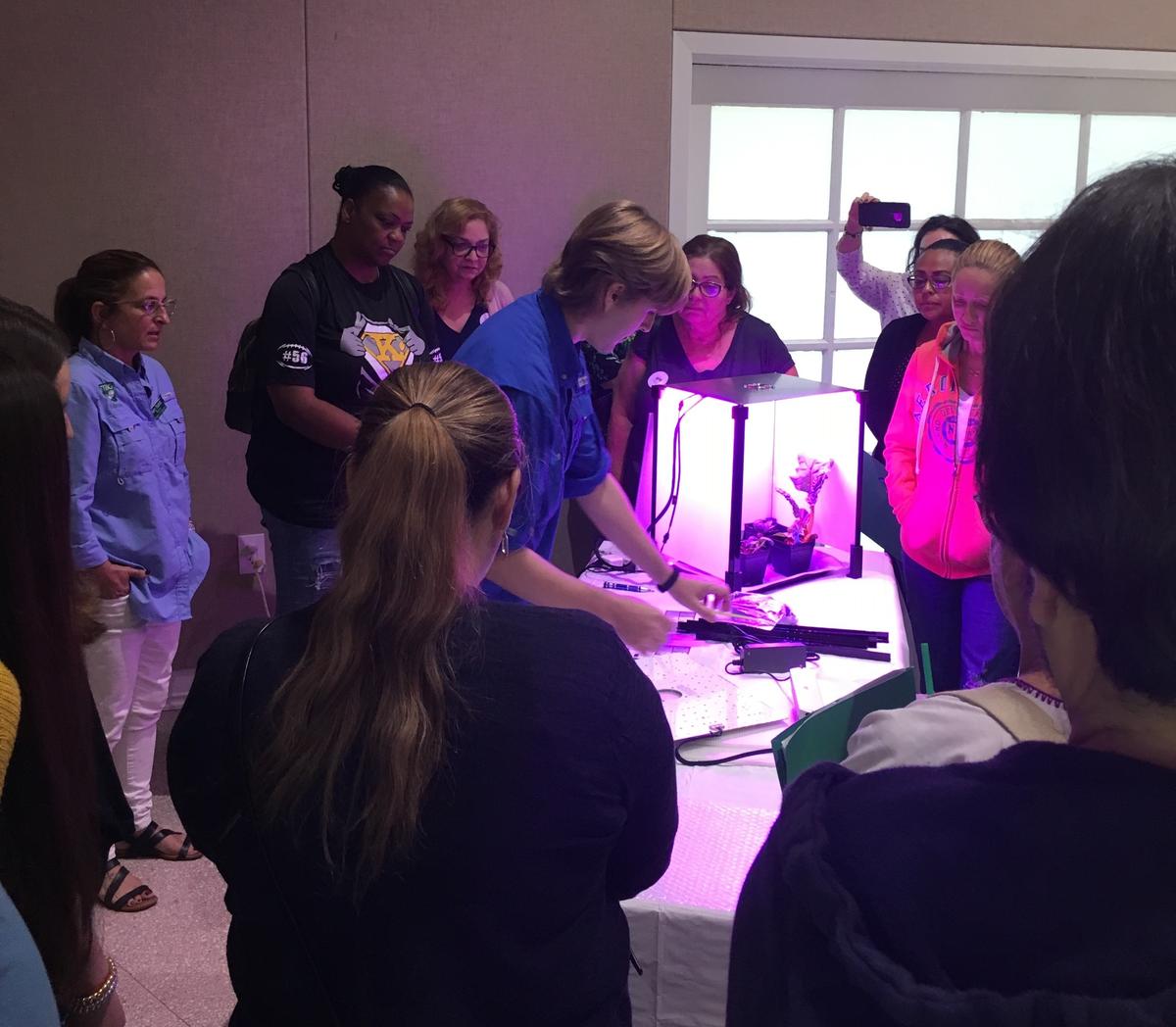 Jordan DeWitt, Fairchild’s Innovation Studio Specialist, shows teachers how to assemble the growth chamber at a recent workshop at Fairchild Tropical Botanic Garden in Coral Gables. The teachers are working with their students, NASA and Fairchild to learn how to grow edible plants in space. It’s part of the ‘Growing Beyond Earth’ program at Fairchild.