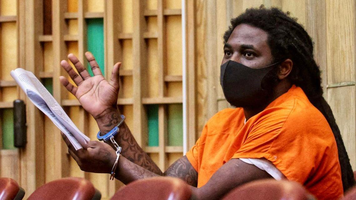 Convicted murderer Melchi Thomas sits in Miami-Dade circuit court on April 25, 2022. He was convicted of the 2016 murder of Antonio Bell in Overtown.