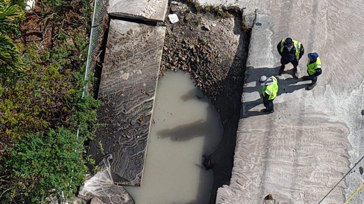 City of Fort Lauderdale workers respond to a 6-by-4-foot sinkhole at Northwest 27th Avenue and Northwest Second Street in Fort Lauderdale, Monday, Jan. 26, 2026. 